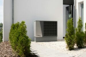 A modern heat pump installed outside a home.
