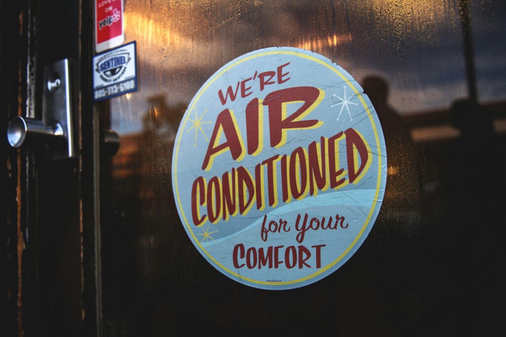 A sticker says "We're air conditioned for your comfort".