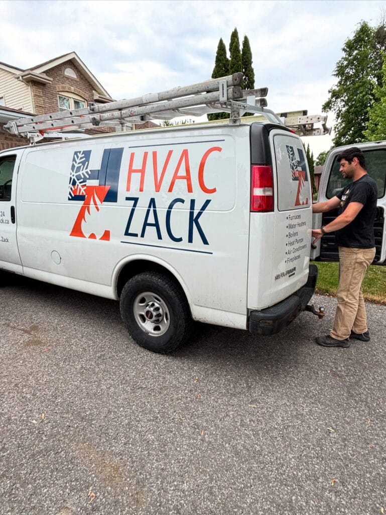 HVAC Zack van at a Pickering home as a technician prepares for a furnace installation.