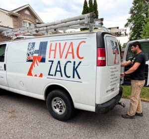 HVAC Zack van at a Pickering home as a technician prepares for a furnace installation.