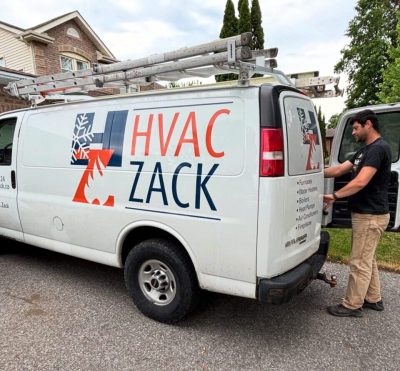 HVAC Zack van at a Pickering home as a technician prepares for a furnace installation.