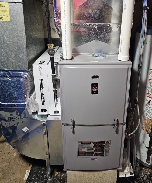 Furnace Repair in Durham Region | HVAC Zack High-efficiency gas furnace with filters and venting during a repair visit in a Durham Region basement.